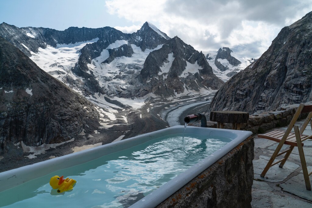 An ice bath in the middle of snowy mountains.
