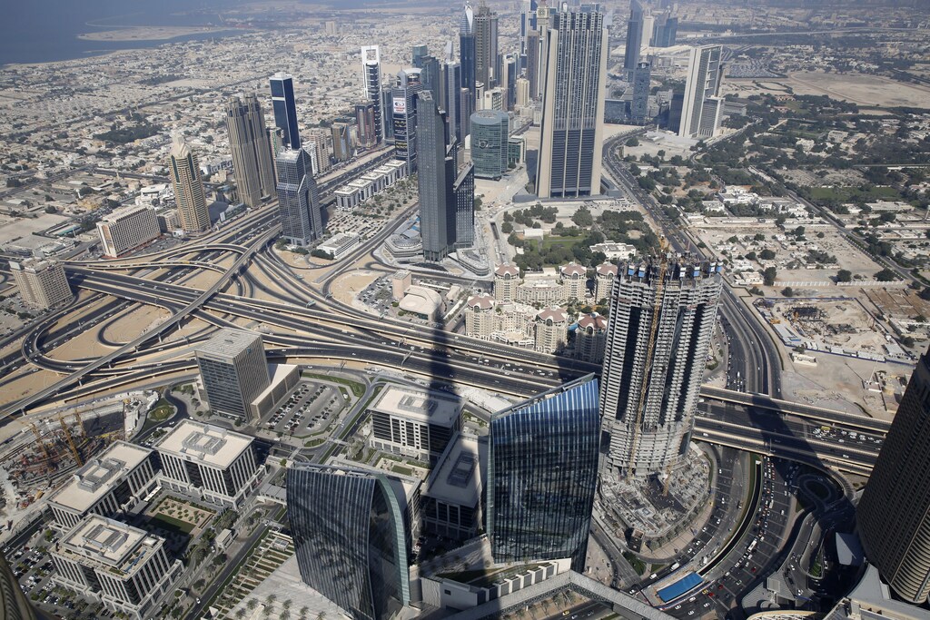 An aerial view of Dubai from Burj Khalifa, the tallest building in the world, in Dubai November 19, 2014. REUTERS/Ahmed Jadallah (UNITED ARAB EMIRATES - Tags: BUSINESS SOCIETY CITYSCAPE) - GM1EABJ1OHR01