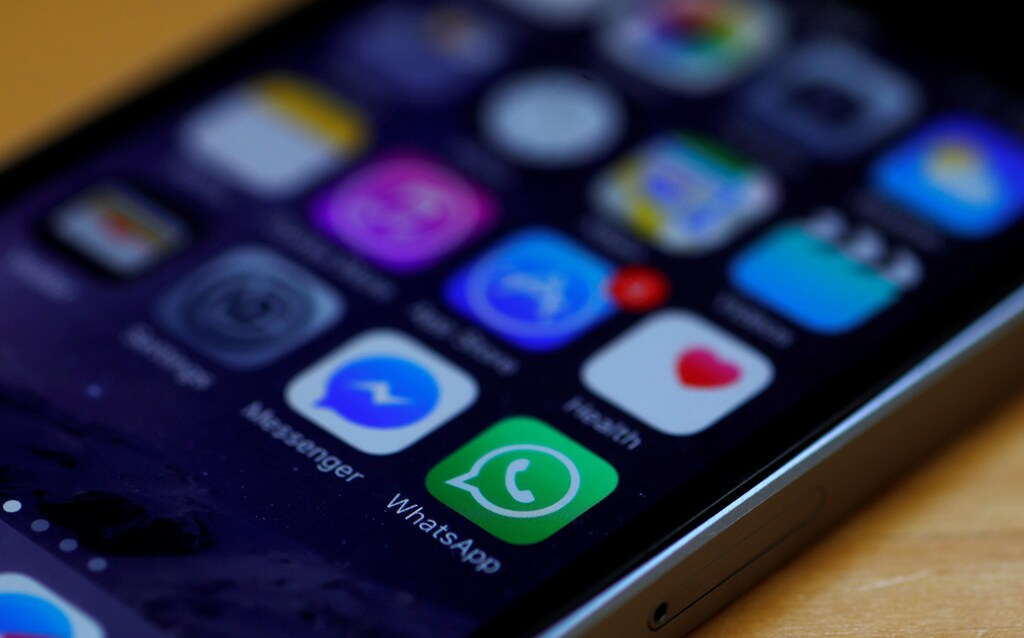 WhatsApp and Facebook messenger icons are seen on an iPhone in Manchester , Britain March 27, 2017. REUTERS/Phil Noble - RC136D014E90