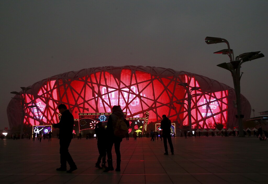 An advertisement of Alibaba Group's 11.11 Global shopping festival is projected on exterior of the National Stadium, also known as the "Bird's Nest", in Beijing, China, November 11, 2015. Chinese e-commerce giant Alibaba Group Holdings Ltd said on Wednesday the value of merchandise it has sold so far during the Singles' Day online shopping extravaganza had surpassed last year's total of $9.3 billion.REUTERS/Kim Kyung-Hoon - RTS6FPA