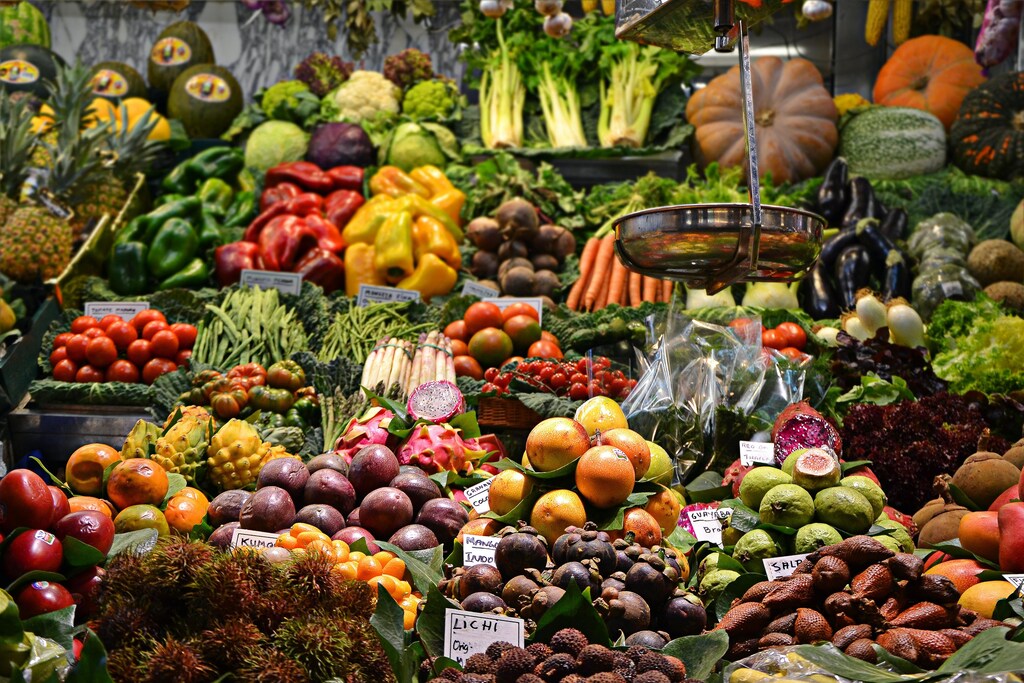 Fruit and vegetables on display in a market.