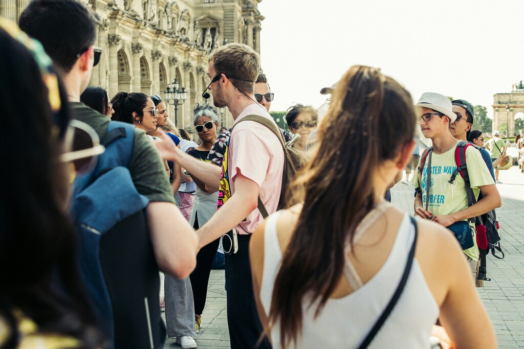 Tour guide and group in Paris, France: Destination readiness is central to the World Economic Forum's Travel and Tourism Development Index