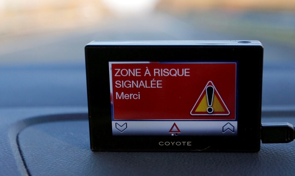 A Coyote system is seen in a vehicle as it provides real-time information on speed limits, dangers locations, traffic hazards and traffic conditions along the A62 motorway in Toulouse December 31, 2014.