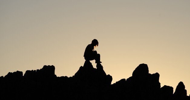 A girl sits on rocks during the summer solstice at the Kokino megalithic observatory, June 20, 2012. The 3,800-year-old observatory was discovered in 2001 in the northwestern town of Kumanovo, 70 km (43 miles) north from Skopje, and is ranked as the fourth oldest observatory in the world, according to NASA. REUTERS/Ognen Teofilovski