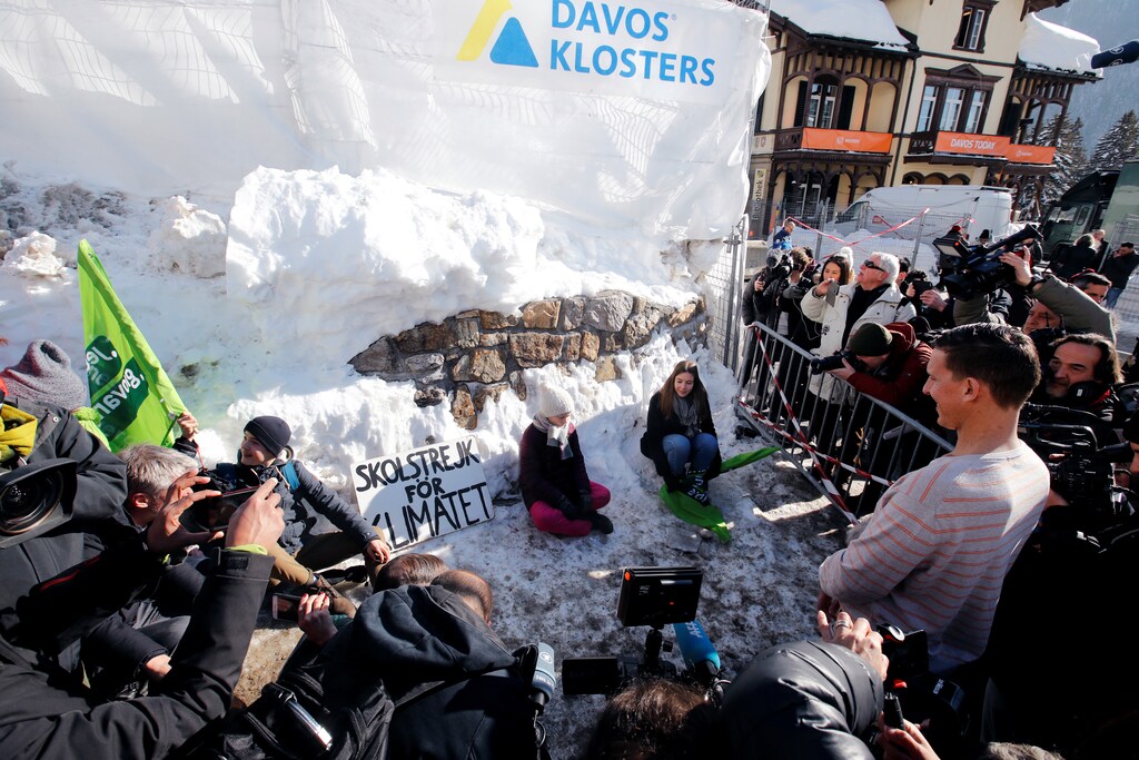 16-year old Swedish environmental activist Greta Thunberg stages a sit down protest in front of the Congress Centre during the World Economic Forum (WEF) annual meeting in Davos, Switzerland, January 25, 2019.