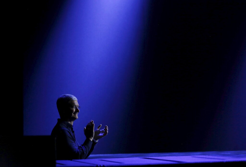 Apple CEO Tim Cook waits to return to stage during his keynote address at the Worldwide Developers Conference in San Francisco, California June 8, 2015.