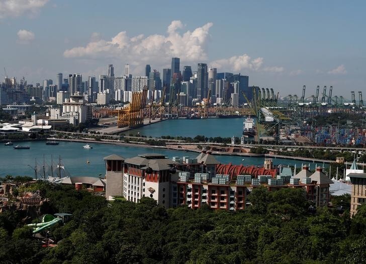 A view of Sentosa island and the skyline of the central business district in Singapore June 4, 2018. Picture taken June 4, 2018. REUTERS/Edgar Su