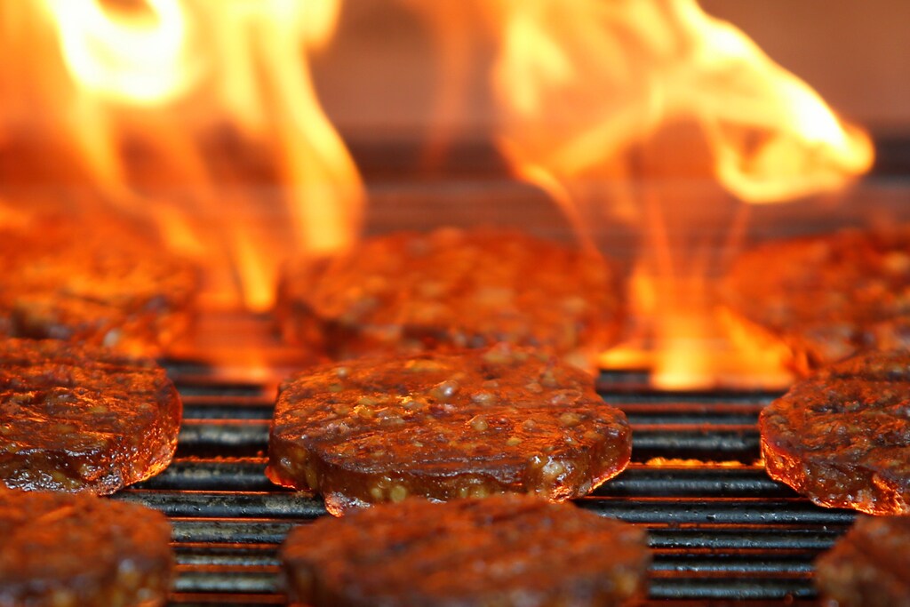 Veggie burgers are cooked over a flame on a grill in Greenwich, Connecticut, U.S., on June 26, 2017. REUTERS/Adrees Latif - RC1E5872A3A0