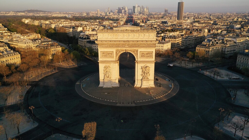 An aerial view shows the deserted Place de l'Etoile and the Arc de Triomphe, during a lockdown imposed to slow the spread of the coronavirus disease (COVID-19) in Paris, France April 4, 2020. Picture taken with a drone.