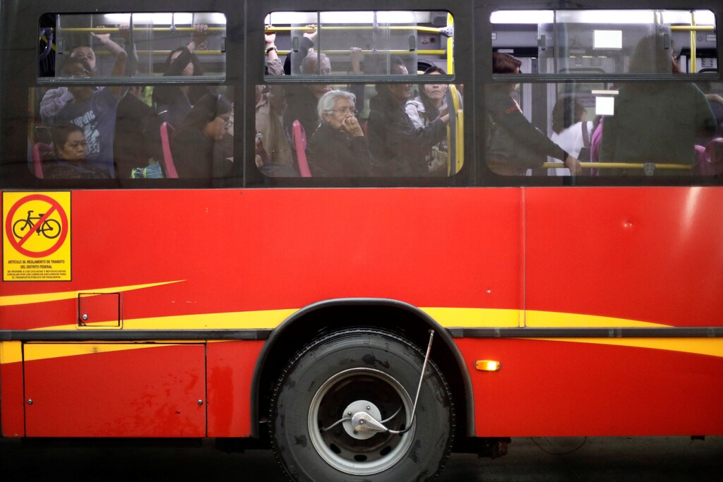 An elderly woman is pictured inside a bus on a rainy day in Mexico City, Mexico, June 29, 2017. Picture taken June 29, 2017. REUTERS/Edgard Garrido - RC191AF49BB0