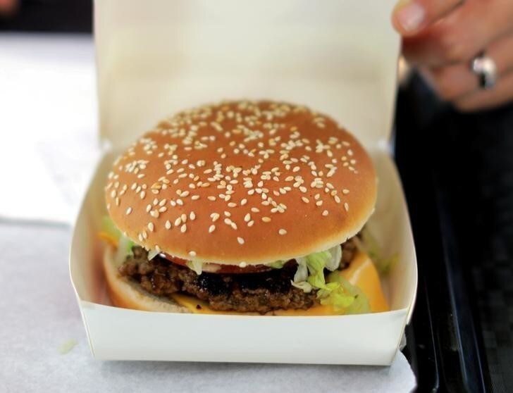 An employee prepares food orders at the Isla Burger Halal fast-food in Nice, France, September 25, 2017. REUTERS/Eric Gaillard
