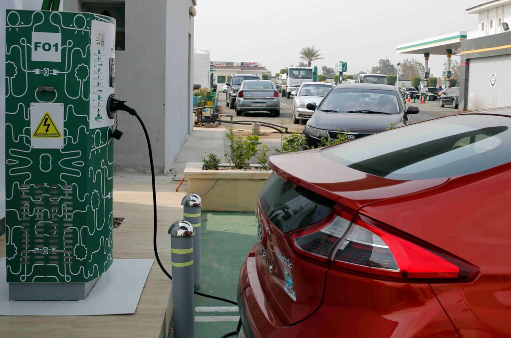 An electric car charging box is seen with Hyundai's Ioniq as an effort to reduce fuel consumption and gradually decrease the country's carbon footprint, at Revolta charging station in Cairo, Egypt, February 19, 2018. Picture taken February 19, 2018. REUTERS/Amr Abdallah Dalsh - RC11DBB32060