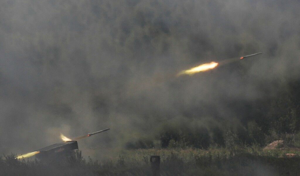 A Russian Tornado-G multiple rocket launcher fires during a demonstration at the annual international military-technical forum "ARMY" in Alabino, outside Moscow, Russia August 23, 2018. REUTERS/Maxim Shemetov - RC1119C12E50