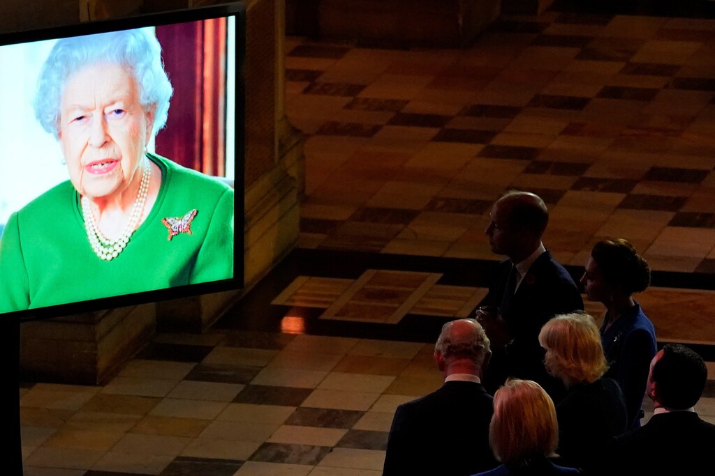 Britain's Prince Charles, Camilla, Duchess of Cornwall, Prince William and Catherine, Duchess of Cambridge, watch as Britain's Queen Elizabeth makes a video message to attendees of an evening reception to mark the opening day of the UN Climate Change Conference (COP26), in Glasgow, Scotland, Britain November 1, 2021. Alberto Pezzali/Pool via REUTERS