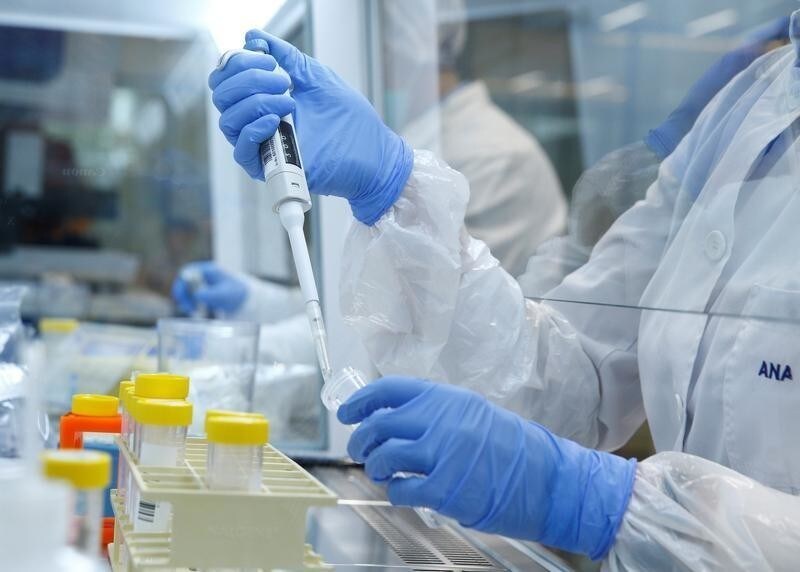 A lab technician performs a test at the laboratory of the ICMP (International Commission on Missing Persons) Headquarters in the Hague, the Netherlands, October 24, 2017.