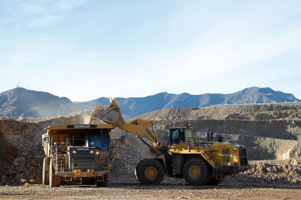 A wheel loader operator fills a truck with ore at the MP Materials rare earth mine in Mountain Pass, California, U.S. January 30, 2020