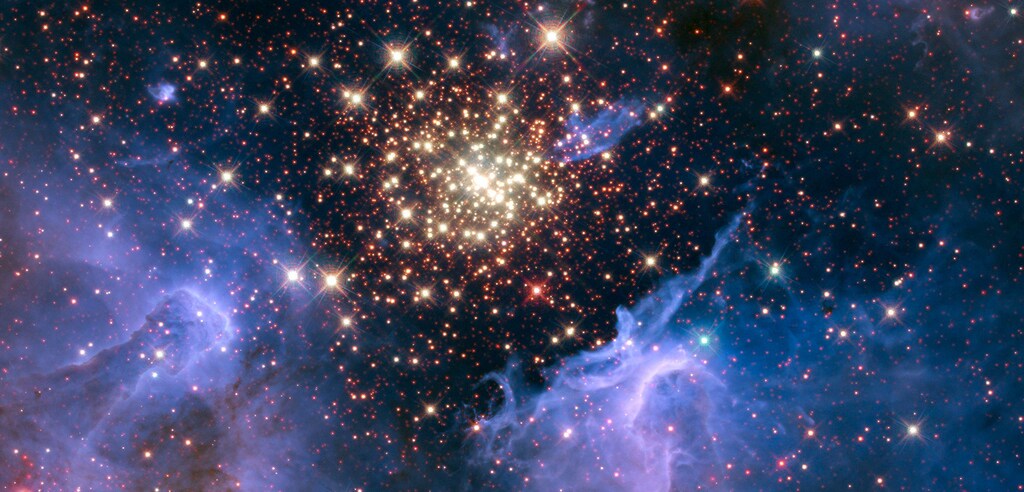 A cluster of young stars resembles an aerial burst, surrounded by clouds of interstellar gas and dust, in a nebula NGC 3603 located in the constellation Carina, in this image captured in August 2009 and December 2009, and obtained September 26, 2018. NASA/ESA/R. O'Connell/F. Paresce/E. Young/Ames Research Center/WFC3 Science Oversight Committee/Hubble Heritage Team/STScI/AURA/Handout via REUTERS THIS IMAGE HAS BEEN SUPPLIED BY A THIRD PARTY. IT IS DISTRIBUTED, EXACTLY AS RECEIVED BY REUTERS, AS A SERVICE TO CLIENTS - RC18FF2D9B00