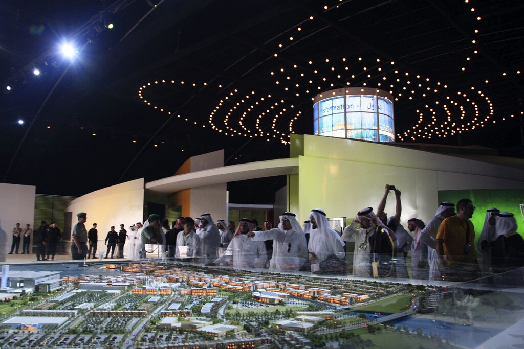 Visitors look at a model of King Abdullah University of Science and Technology (KAUST) displayed at the opening ceremony of the university in Jeddah September 23, 2009.