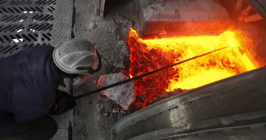 A worker operates an electrolysis furnace, which produces aluminium from raw materials, at the electrolysis shop of the Rusal Krasnoyarsk aluminium smelter plant in the Siberian city of Krasnoyarsk February 3, 2010. The plant is one of the biggest aluminium plants in Russia