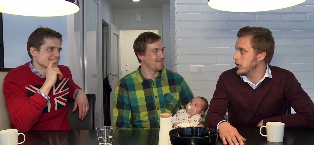 The founders of Finnish Baby Box Anton Danielsen, Heikki Tiittanen and Anssi Okkonen (L-R) talk in this still image taken from video in Espoo April 29, 2015. From their suburban Helsinki homes, three thirty-something fathers are hoping to create an international market for a peculiarly Finnish package - a baby box. Finland has sent the boxes - including baby clothes, a sleeping bag and nipple cream among other items - to parents-to-be in Finland since the 1930s when infant mortality was high. Image taken April 29, 2015. REUTERS/Attila Cser - RTX1BTWT