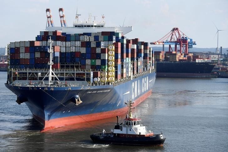 Container ship CMA CGM Georg Forster arrives at a loading terminal in the port of Hamburg Germany July 26, 2018. Picture taken July 26, 2018. REUTERS/Fabian Bimmer