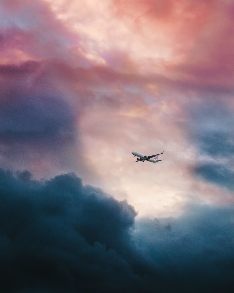 Aviation, airlines, flying, biofuels; national biofuel policies, sustainable aviation; plane clouds sky, take off.