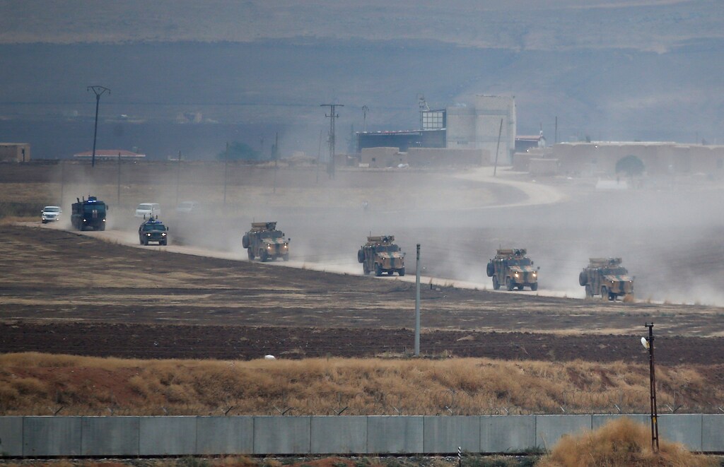 Turkish and Russian military vehicles return following a joint patrol in northeast Syria, as they are pictured near the Turkish border town of Kiziltepe in Mardin province, Turkey, November 1, 2019. REUTERS/Kemal Aslan - RC1815599D90