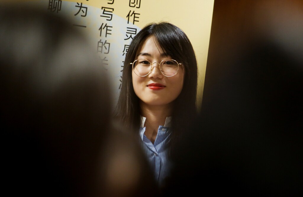 Writer Zhao Zengliang attends a book presentation and discussion at the Sisyphe bookstore in Beijing, China, August 4, 2017. Picture taken August 4, 2017. REUTERS/Thomas Peter - RC12D3B00540