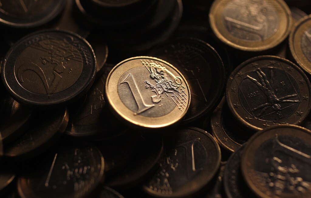 Euro coins are seen in this photo illustration taken in Rome, December 9, 2011. The euro fell to a one-month low versus sterling on December 12, 2011 as a lack of decisive action from EU leaders and the European Central Bank to fix the euro zone's debt crisis in the near-term forced investors to broadly sell the single currency. Picture taken December 9, 2011. REUTERS/Tony Gentile (ITALY - Tags: BUSINESS) - GM1E7CC1HJC01