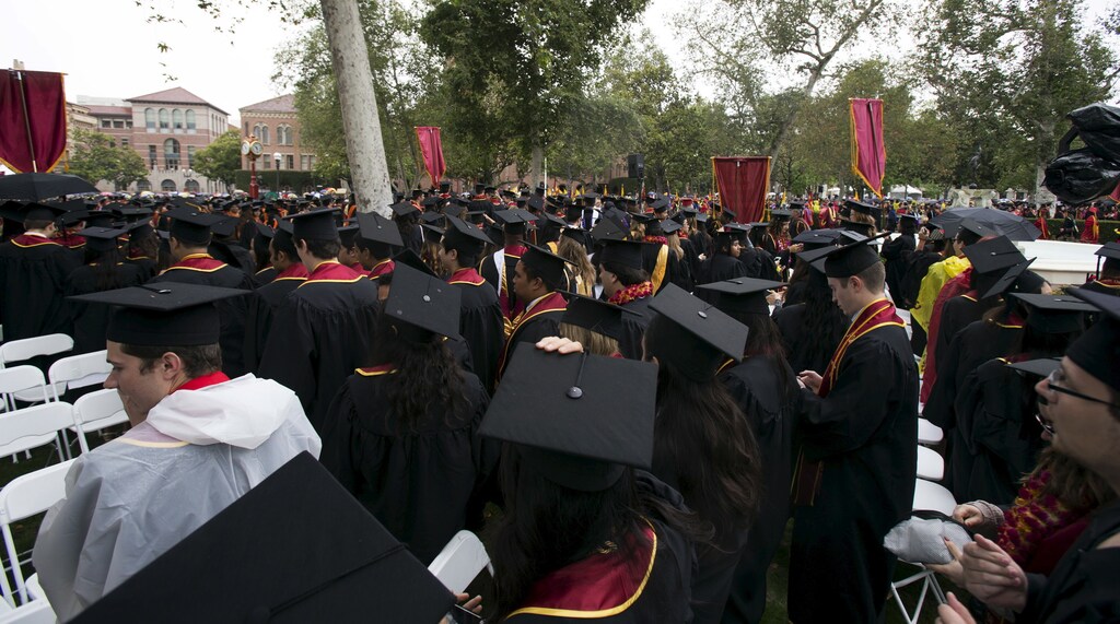 Graduating students attend USC's Commencement Ceremony at University of Southern California in Los Angeles, California May 15, 2015. REUTERS/Mario Anzuoni - GF10000096421