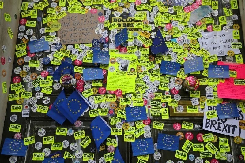 Stickers are seen attached to the Cabinet Office exterior door after an anti-Brexit march through central London, Britain October 20, 2018.
