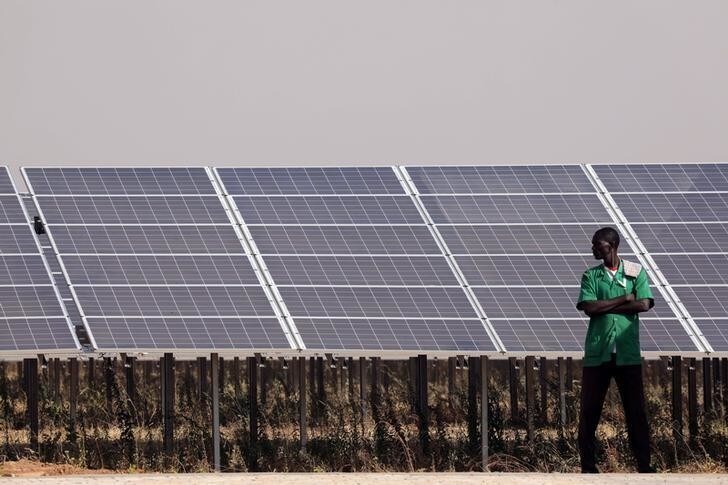 Solar panels are seen during the inauguration ceremony of the solar energy power plant in Zaktubi, near Ouagadougou, Burkina Faso, November 29, 2017. REUTERS/Ludovic Marin/Pool