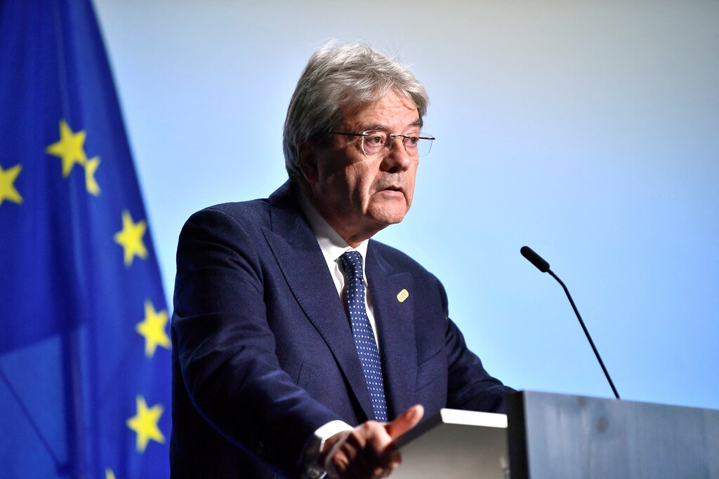 European Commissioner for Economy Paolo Gentiloni. The ECB has raised its key rate to 4% as the Eurozone faces lower economic growth.