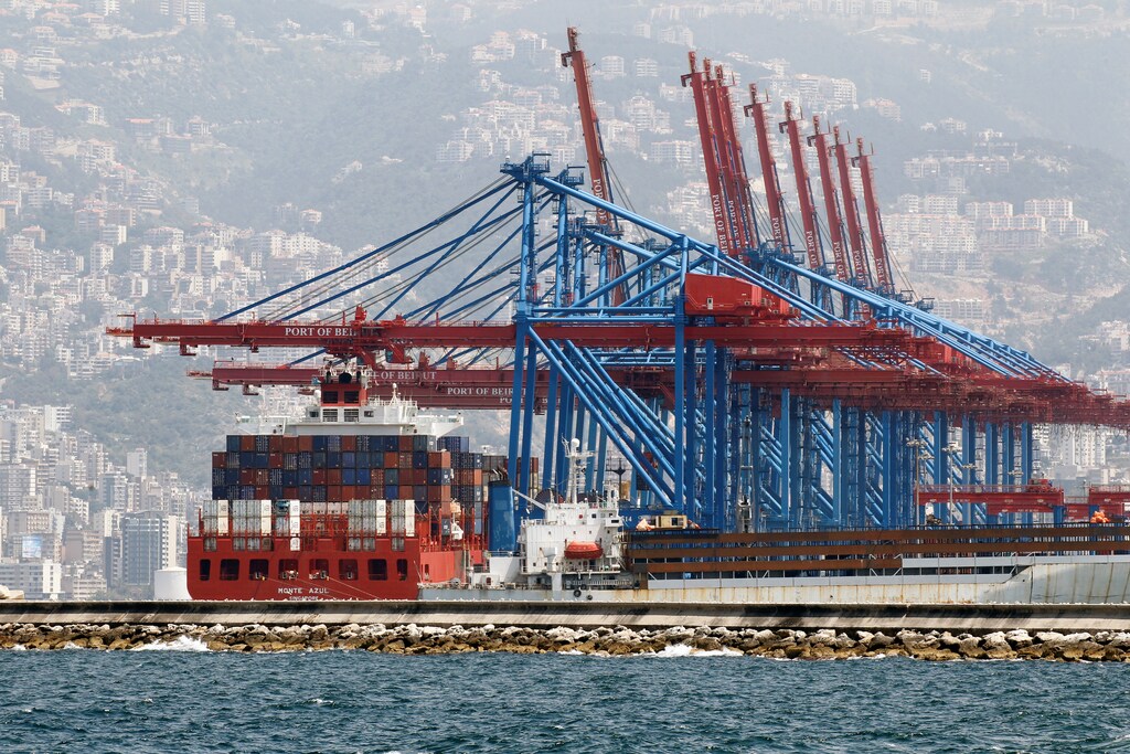 Shipping containers are seen stacked at Beirut's port during a countrywide lockdown to combat the spread of the coronavirus disease (COVID-19), in Beirut, Lebanon April 19, 2020. REUTERS/Mohamed Azakir - RC2R7G9XSY65