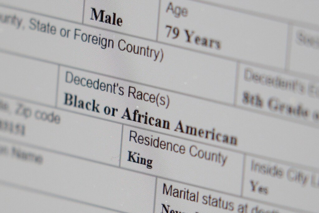 A working copy of a death certificate for a man who died of coronavirus disease (COVID-19) indicates that the manâs race was âBlack or African American,â as seen on a computer screen at the Dayspring & Fitch Funeral Home offices, in Seattle, Washington, U.S. April 7, 2020. REUTERS/David Ryder - RC200G92LWBF