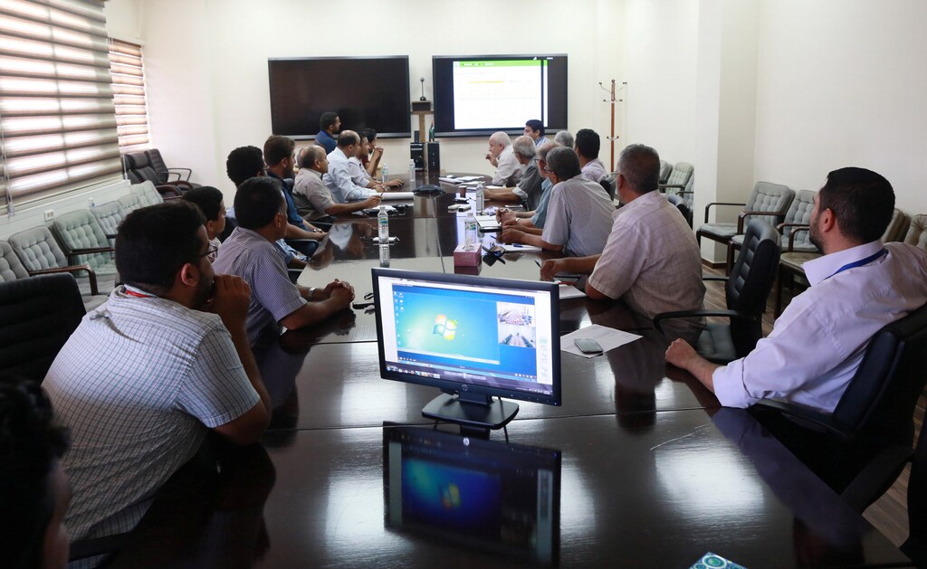 Employees attend a meeting at the Arabian Gulf Oil Company's (AGOCO) headquarters in Benghazi, Libya, September 29, 2016.