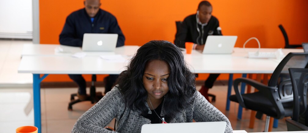 An employee of tech start-up Sendy, which offers online logistics services, works on her computer at their office in Nairobi, Kenya
