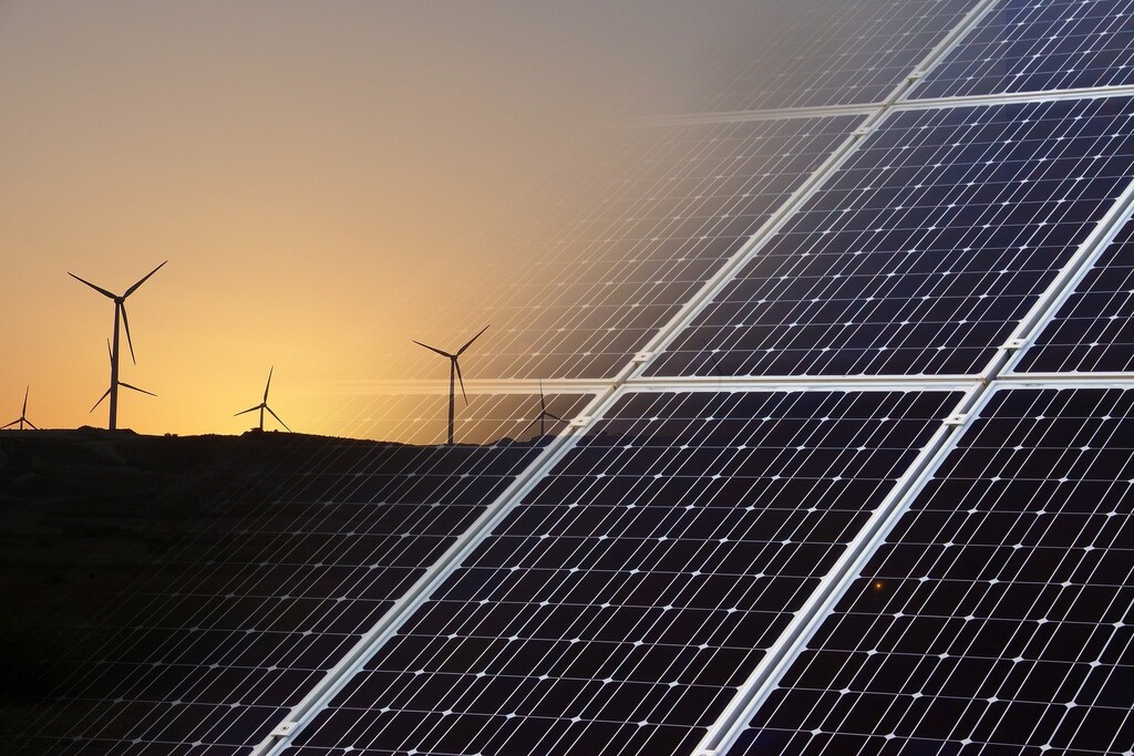 Wind turbines and solar panels.
