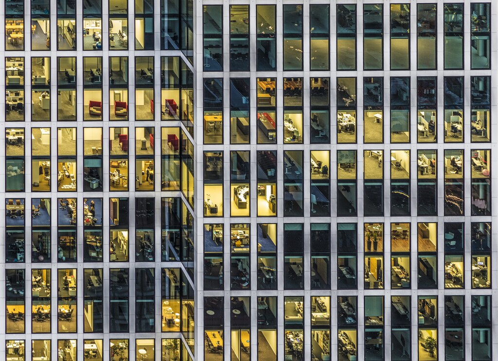 Facade of an office building in Frankfurt by night.