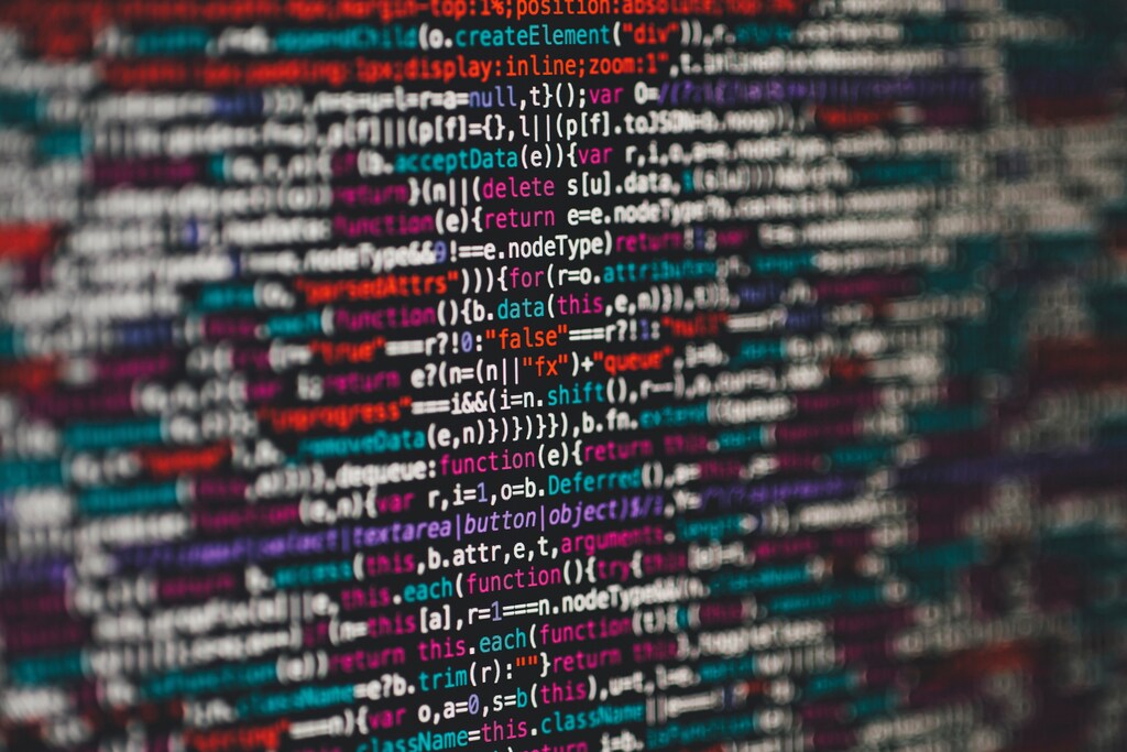 programming data on a dark screen illustrating AI, machine learning, artificial intelligence