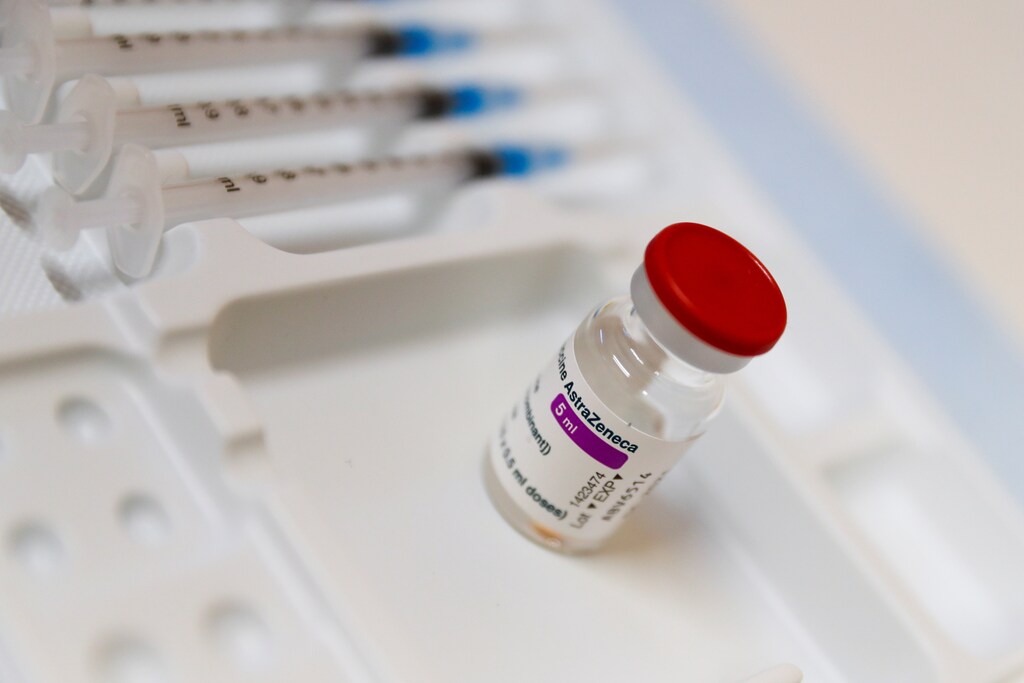 A vial of AstraZeneca coronavirus disease (COVID-19) vaccine is seen at a vaccination centre, as Portugal resumes vaccination with AstraZeneca shots after a temporary suspension, amid the coronavirus disease (COVID-19) pandemic, in Seixal, Portugal, March 22, 2021. REUTERS/Pedro Nunes - RC2HGM9G7NNS