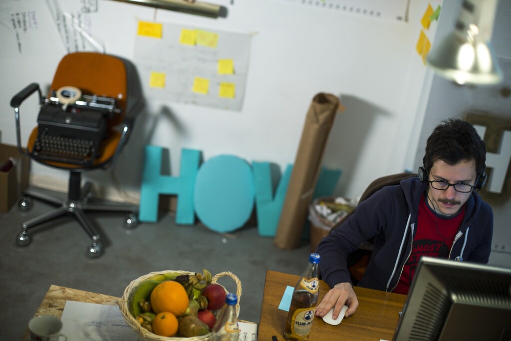 Alessandro Contini of Italy works in the office of the HowDo, a "how-to-do-it-yourself" app,start-up company at the Wostel co-working space in Berlin March 18, 2013. Europe must urgently tackle youth unemployment, the French, German and Italian governments said May 28, 2013, urging action to rescue an entire generation who fear they will not find jobs.Some 7.5 million Europeans aged 15-24 are neither in employment nor in education or training, according to EU data. Youth unemployment in the EU stood at 23.6 percent in January, more than twice as high as the adult rate. Picture taken March 18, 2013. REUTERS/Thomas Peter (GERMANY - Tags: BUSINESS EMPLOYMENT) - RTX103SA
