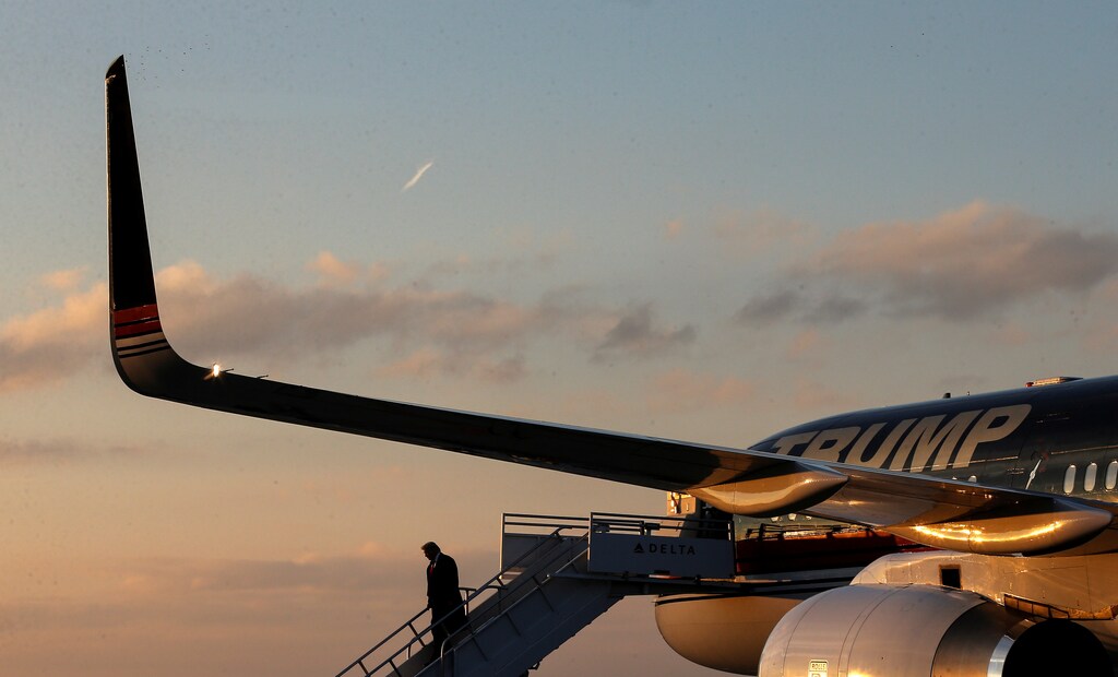 U.S. President-elect Donald Trump exits his plane after landing at the Cincinnati/Northern Kentucky International Airport in Hebron, Kentucky, U.S., December 1, 2016. REUTERS/Mike Segar - RTSU9TL