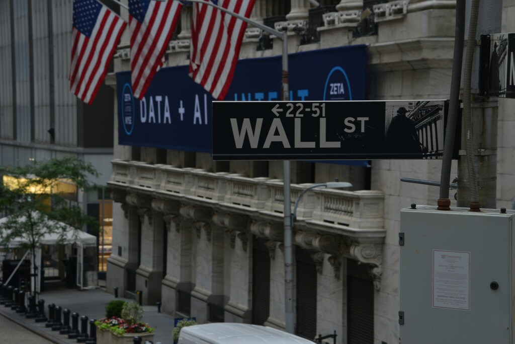 Illustrative image of Wall Street in New York City. Many private equity firms are planning to multiply AI investments in the coming year.