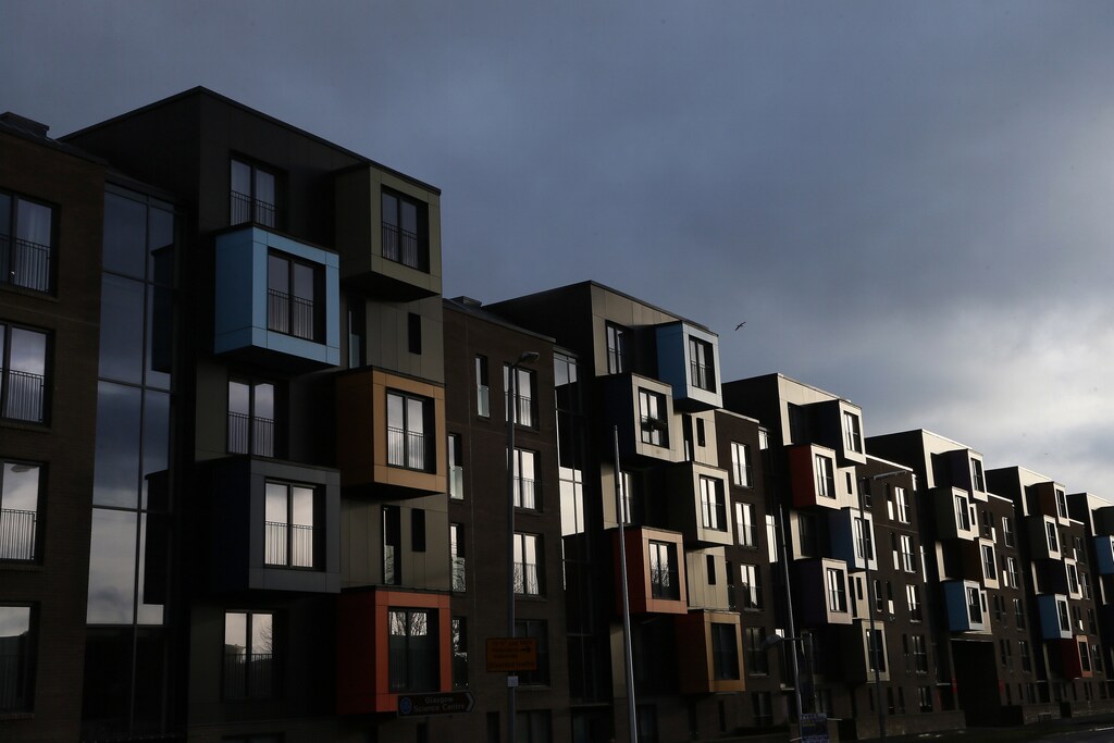 Apartment housing blocks are seen in Govan, Glasgow, Scotland January 16, 2014. The British shipbuilding industry has been through a turbulent time after defence contractor BAE Systems announced in November that it planned to lay off 1,775 ship workers across the UK. The cuts signal the end of more than 500 years of shipbuilding in Portsmouth on England's south coast. BAE is set to continue constructing ships in Glasgow, but showy entertainment venues, museums and new housing blocks have replaced many of the shipyards that once lined the citys famous River Clyde. Long gone are the days when the area was an industrial powerhouse producing around a fifth of the world's ships. Now Glasgow promotes itself instead as a financial and commercial hub  although it still struggles with high unemployment. Picture taken January 16, 2014. REUTERS/Stefan Wermuth (BRITAIN - Tags: BUSINESS EMPLOYMENT SOCIETY REAL ESTATE)ATTENTION EDITORS: PICTURE 14 OF 26 FOR PACKAGE 'BRITAIN'S SHIPBUILDING LEGACY'SEARCH 'WERMUTH SHIPBUILDING' FOR ALL PICTURES PXP01-PXP26 - GM1EA2Q14DH01