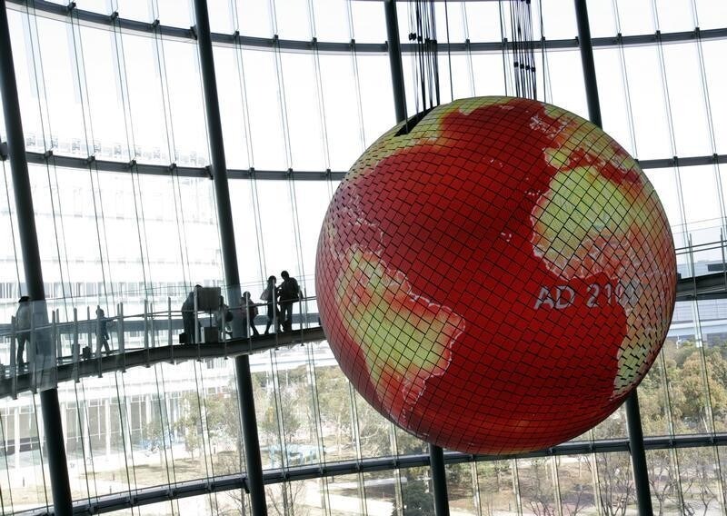 The "Geo-Cosmos", covered with one million LEDs (light emitting diodes), displays a simulation of future global warming at the National Museum of Emerging Science and Innovation (Miraikan) in Tokyo April 5, 2007. Global warming could cause more hunger in Africa and melt most Himalayan glaciers by the 2030s, according to a draft U.N. report due on Friday which also warns that the poorest nations are likely to suffer most. REUTERS/Yuriko Nakao(JAPAN) - GM1DUYXTBMAA