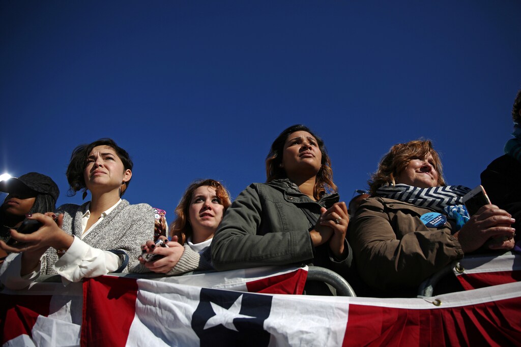 Supporters listen as US President Barack Obama speaks at a campaign event in support of U.S. Democratic presidential nominee Hillary Clinton in Cleveland, Ohio, U.S. October 14, 2016. REUTERS/Carlos Barria - RTSSA0Z