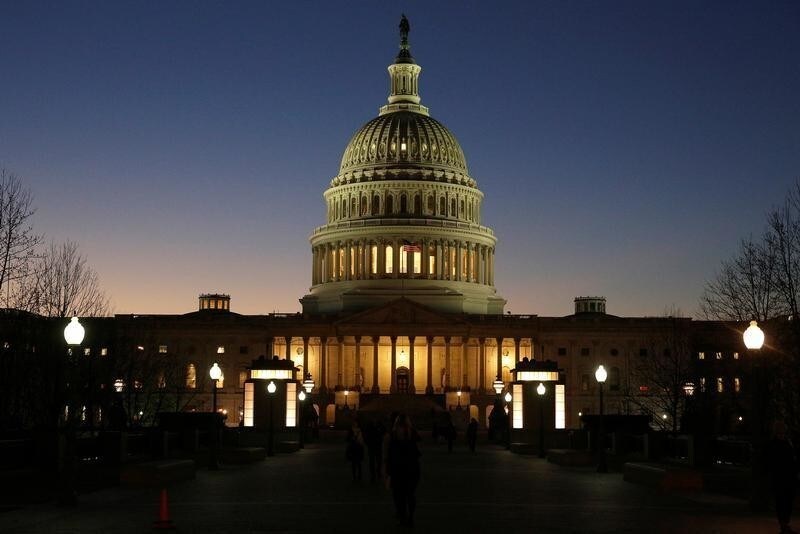 The U.S. Capitol Building is lit at sunset in Washington, U.S., December 20, 2016. REUTERS/Joshua Roberts