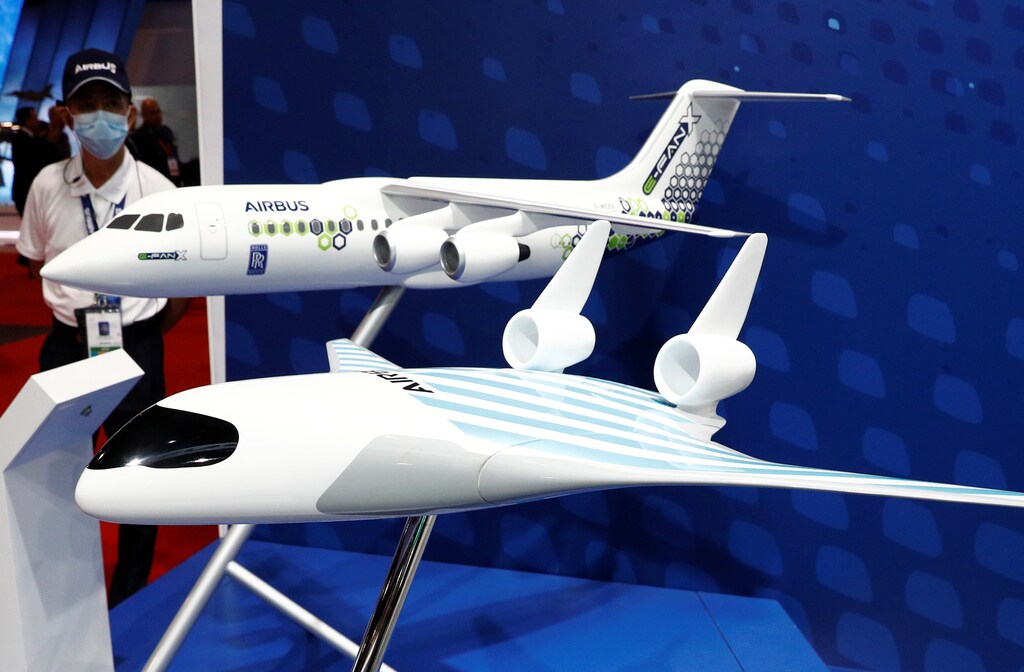 A view of models of Airbus' MAVERIC and E-Fan X aircraft at the Singapore Airshow in Singapore February 11, 2020. REUTERS/Edgar Su - RC23YE9J0S26