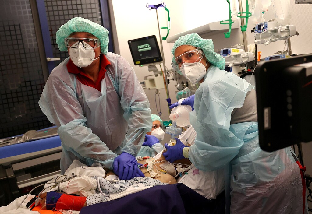 Doctor Katharina Franz and paramedic Andreas Hanke reanimate a COVID-19 patient in Hanau, Germany, April 2020.